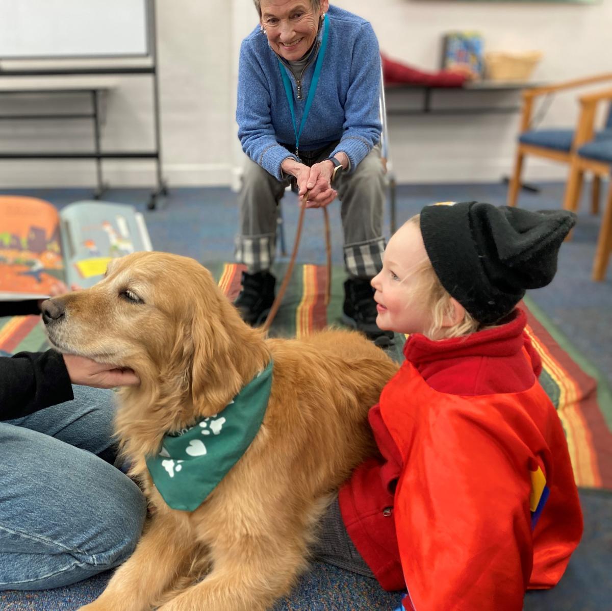 young patron with golden retriever